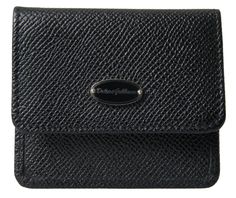 Indulge in the luxury of a Dolce & Gabbana hallmark piece with this elegant coin purse wallet. Crafted from premium black leather, this stylish accessory is a blend of Italian craftsmanship and timeless design. Featuring a compact bifold structure, it provides a sophisticated way to organize your coins and cards, accented with the distinctive logo plaque for an unmistakable touch of class. Constructed with exquisite attention to detail, this wallet exudes quality and luxury, making it the perfect addition to your everyday essentials or a special gift for a loved one.
Color: Black
Material: 100% Leather
Country of origin: Italy Coin Slot, Coin Purse Wallet, Black Textures, Bifold Wallet, Dolce & Gabbana, Stylish Accessories, Wallets For Women, Purse Wallet, Everyday Essentials Products