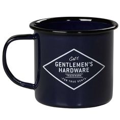 a black ceramic mug with the gentlemen hardware logo on it's front and sides