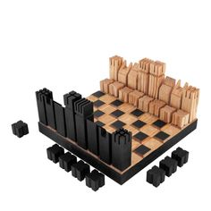 a wooden chess board with black pieces on it