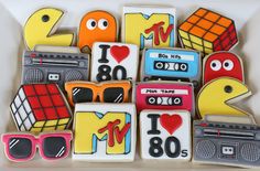 decorated cookies in the shape of old school radio, tape recorders and boomboxes