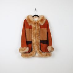 Tag: None Size: None listed (fits like a medium) Pit to Pit: 21' Length: 30' Vintage Patchwork Winter Outerwear, Vintage Patchwork Outerwear For Winter, Retro Winter Outerwear With Faux Fur Trim, Vintage Outerwear With Faux Fur Lining And Long Sleeves, Retro Fall Fur Coat With Faux Fur Lining, Retro Fur Coat With Faux Fur Lining For Fall, Retro Faux Fur Lined Coat For Fall, Retro Brown Patchwork Outerwear, Vintage Fall Outerwear With Faux Fur Lining