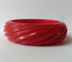 "This vintage cherry red Bakelite bangle measures approximately 2-9/16\" (6.6 cm) across the inside and 13/16\" (2.1 cm) in width. Weighs 53.7 grams. This has been tested positive for Bakelite with Simichrome. Good condition." Vintage Red Round Bangle, Rose Gold Band Ring, Bakelite Bracelets, Bakelite Jewelry, Plastic Bangles, Bakelite Bangles, Vintage Cherry, Turquoise Bracelet Cuff, Red Jewelry