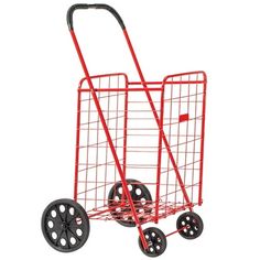 a red shopping cart with wheels and black spokes on the front, isolated against a white background