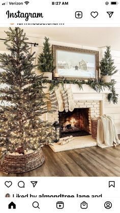 a christmas tree is sitting in front of a fireplace