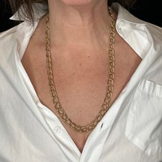 This modern 14k yellow gold chain necklace has a beautiful feel. At twenty-five inches in length, this necklace is able to be doubled up around the neck or just worn as a single stand. The ease of the necklaces design makes it an excellent way to dress up any outfit. Elegant Long 14k Gold Chain Necklace, Classic Gold-tone Long Necklace, Classic Long Yellow Gold Necklace, Classic Yellow Gold Long Necklace, Timeless Gold-tone Oval Link Necklace, Formal Long 14k Gold Chain Necklace, Classic Gold Chain Long Necklace, Elegant Yellow Gold Link Chain Necklace, Chic Yellow Gold Necklaces For Formal Occasions