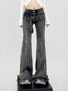 Infuse your wardrobe with a dash of rebellion with our Layered-Effect Denim Flare-Leg Jeans, complete with a grommet belt detail for that extra edge. Crafted from premium denim, these jeans are characterized by their layered look and skinny yet flared silhouette, promising to deliver both comfort and attitude. The intricate grommet belt detail not only accentuates the waist but also adds a unique, punk-inspired aesthetic that sets these jeans apart from the ordinary. Elevate your casual daywear Punk Style Fitted Wide Leg Jeans, Fitted Dark Wash Punk Jeans, Fitted Punk Jeans In Dark Wash, Fitted Punk Style Denim Jeans, Punk Style Fitted Dark Wash Jeans, Punk Style Straight Leg Denim Flare Jeans, Punk Style Fitted Mid-rise Jeans, Punk Style Fitted Jeans For Alternative Fashion, Edgy Fitted Dark Wash Flare Jeans