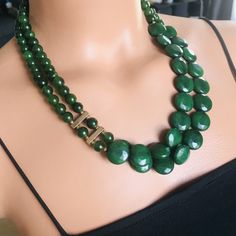 📍 Description :  The handmade multistrand necklace has been designed with Agate gemstone in green colour. 💥 The colours of the stone may differ slightly in photo shoots caused by lighting and reflections. ✂ Materials : The natural stone used are; green colour Agate gemstone in round shape The chain and gold-colored materials used are 14 carat gold plated and do not tarnish. 📐 Dimensions : 1st necklace : has a length of 48 centimeters/20 inç and can be adjusted using an extention cord. The wei Green Beaded Necklace With Natural Stones, Elegant Green Beaded Necklace With Large Beads, Green Gemstone Beads Necklace, Green Beaded Necklace With Faceted Beads, Green Multi-strand Beads For Gifts, Luxury Green Agate Beaded Necklaces, Green Multi-strand Beaded Necklace With Natural Stones, Nature-inspired Green Necklaces With Large Stone, Green Multi-strand Necklace With Natural Stones