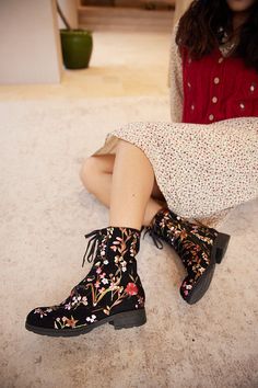 Step into style with Soffia's Plum Blossom Thermoprint Combat Boots. These boots feature a unique thermoprint design inspired by blooming plum blossoms, adding a touch of whimsy to your outfit. Take on any adventure with these statement-making boots. Available in both red and blue prints. 0.98'' heel 5.2 shaft 10.2 circumference Zip / lace-up closure Suede upper Leather / Textile lining Leather footbed Leather midsole Leather insole Rubber sole Fall Floral Print Boots With Round Toe, Spring Floral Embroidered Multicolor Boots, Casual Fall Boots With Floral Embroidery, Winter Floral Print Boots, Casual Winter Boots With Floral Print, Casual Boots With Floral Embroidery And Round Toe, Casual Fabric Boots For Fall, Black Floral Print Boots With Round Toe, Multicolor Flat Heel Boots For Spring