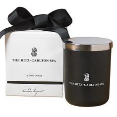 the ritz - carlton spa scented candle with box and black ribbon on white background