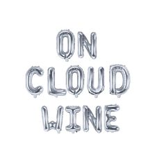 the words on cloud wine are made out of silver foil balloons in front of a white background