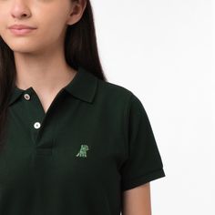 Essential style for the kids, our regular polo is made with the finest Pima Cotton for a fresh an stylish for an everyday look. Made in Peru100% CottonEmbroidered James Bark Logo Green Cotton Sporty Polo Shirt, Green Sporty Cotton Polo Shirt, Green Cotton Polo Shirt With Collared Neckline, Sporty Green Cotton Polo Shirt, Preppy Cotton Tops With Collared Neckline, Preppy Fitted Top With Polo Collar, Green Fitted Classic Polo Shirt, Green Collared Cotton Polo Shirt, Green Cotton Collared Polo Shirt