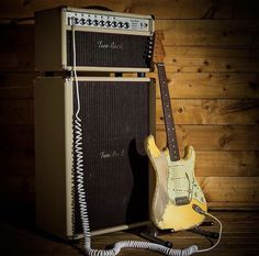 an electric guitar and amp sitting next to each other