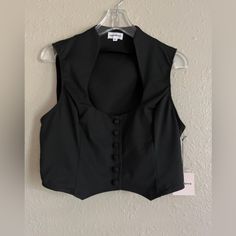 Nwt Superdown Vest. Front Button Closure, A Curved Hem, Crepe Fabric. Cropped Style. Approximate Measurements Size Xl Pit To Pit 19” Length 18” #T3 Black Vest With Button Closure For Spring, Cropped Style, Crepe Fabric, Jackets & Coats, Jackets For Women, Fabric, Women Shopping, Black, Color