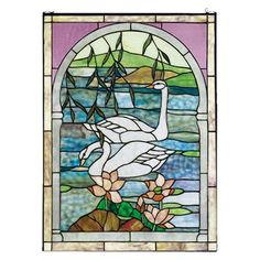 a stained glass window with a swan on it