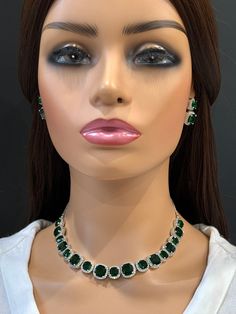 Emerald CZ diamond Necklace, Indian Pakistani wedding Jewelry, Mother of the Bride, Crystal Necklace, Bridesmaid, Gift for her  Gorgeous Emerald CZ Set in aaa quality CZ stones. This American Diamond Necklace Set comes with a pair of earrings. Necklace length 16 inches and shortened to 15 inches  Earrings Length approx 1 inch Regular size and adjustable Arrives in a gift box. Highest quality and craftsmanship Ready to ship from California, United States and delivery in 3-5 days in US Please let me know if you have any questions. Thank you so much for visiting my shop. Color, shades, and texture displayed may slightly vary from the actual product due to digital image limitations. We request you to consider these minor variations. Please expect the possibility of some slight imperfections wh Green Sparkling Stones Jewelry Sets For Wedding, Elegant Green Rhinestone Jewelry Sets, Elegant Green Jewelry Sets With Rhinestones, Emerald Jewel Bridal Necklace For Wedding, Elegant Green Rhinestone Necklace For Wedding, Green Crystal Rhinestone Necklace For Formal Occasions, Formal Green Rhinestone Jewelry, Green Crystal Rhinestone Necklace For Wedding, Crystal Bridal Sets With Rhinestones As Gift