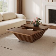 a living room with a couch, coffee table and flower pot on top of it