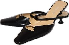 Formal Mules With Sculpted Low Heel, Evening Mules With Leather Sole And Low Heel, Formal Sleek Square Toe Mules, Modern Formal Low Heel Mules, Modern Formal Mules With Low Heel, Modern Low Heel Mules For Formal Occasions, Formal Almond Toe Mules With Padded Heel, Evening Mules With Stacked Low Heel, Formal Mules With Padded Low Heel