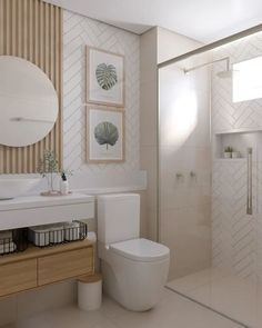 a bathroom with a white toilet sitting next to a walk in shower under a mirror