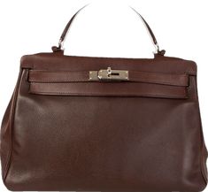 High-end Brown Shoulder Bag With Leather Handles, High-end Brown Bag With Leather Handles, High-end Brown Bags With Leather Handles, Luxury Brown Bags With Silver-tone Hardware, Luxury Brown Bag With Silver-tone Hardware, High-end Brown Shoulder Bag For Office, High-end Brown Business Shoulder Bag, High-end Brown Soft Leather Shoulder Bag, Timeless Brown Bag With Silver-tone Hardware