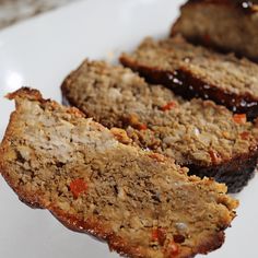 slices of meatloaf on a white plate