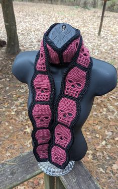 Hand crocheted by ZomBambie Approximately 70 inches long, you can let it hang loosely or wrap around your neck and snuggle up! The skulls are a bright mauve with tiny discreet shimmer thread and sequins, then trimmed in black. Crochet Skull, Skull Scarf, Scarf Crochet, Crochet Scarves, Black Sequins, Hand Crochet, Crochet Scarf, Wrap Around, Scarf Wrap