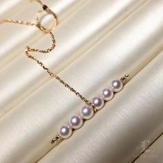 This is an exquisite pearl necklace. It is the famous balance series and including the 18k Gold chain. All Akoya pearls are imported directly from the pearl farms of Japan. Product Information Origin Japan Material Akoya Pearl and 18k Gold Dimensions Necklace Length 40-45cm (Adjustable) Pearl Shaped: Round Size: 5-6mm Quality: AAA Nacre: Very Thick Color: Rose Overtone Luster: Very High Accessories Metal: 18k Gold Other: None We Also Recommend 3.5-4mm Akoya Pearl Fashion Earring 18k Gold - AAA 4 Fine Jewelry Akoya Pearl Chain Necklace, Fine Jewelry Akoya Pearl Necklace, Luxury Akoya Pearl Necklace With Pearl Drop, Luxury Pearl Pendant Necklace With Round Beads, Luxury Akoya Pearl Necklace With Pearl Pendant, Luxury Akoya Pearl Pendant Necklace, Refined Akoya Pearl Necklace As Gift, Refined Akoya Pearl Necklace Gift, Refined Yellow Gold Akoya Pearl Necklace