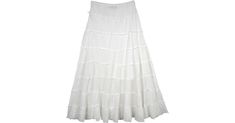 A cool everyday summer fun skirt in angelic white, ankle length, this skirt is divided into eight tiers with slight gathers on them. The tiered layers have an unfinished hem and the skirt is lined up to the knee in cotton fabric as well. The fabric has crushed effect and the skirt is fully flared that flows with you as you move. This is a cool long skirt to wear on a beach or cruise vacation. You can wear this simple skirt casually in the summer season and pair it with a solid or embellished top Bridesmaids Outfits, Long Cotton Skirt, Fairy Stuff, White Long Skirt, Simple Skirt, Fairy Skirt, White Clothing, White Flares, Hippie Look