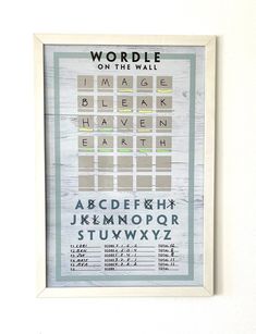 a wooden framed poster with letters and numbers on it