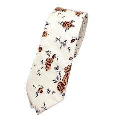 "Beige Floral Tie skinny Add a pop of personality to any formal outfit with this beige floral skinny tie. Made from high-quality materials, this tie is perfect for groomsmen, weddings, or any other formal occasion. The skinny design ensures a sleek and polished look, while the beige color and floral pattern add a touch of fun and flair. Whether you're dressing up for a big meeting or a special event, this tie will help you make a lasting impression. Material:Cotton Approx Size: 57\"(145cm) in the length ; 2.36\"(6cm) in the width Color: Beige Great for Prom Dinners Interviews Photo shoots Photo sessions Dates Engagement Shoots Great for Prom Dinners Interviews Photo shoots Photo sessions Dates Flower skinny tie for weddings and events. Great anniversary present and gift. Also great gift fo Dapper White Suit And Tie Accessories For Summer, Formal White Floral Print Suit And Tie Accessories, Dapper White Adjustable Suit And Tie Accessories, Formal White Suit And Tie Accessories With Floral Print, Floral Print Adjustable Tie, Floral Print Ties For The Groom, Floral Print Ties For Groom, Floral Print Standard Tie For Groom, Floral Print Tie For Groom