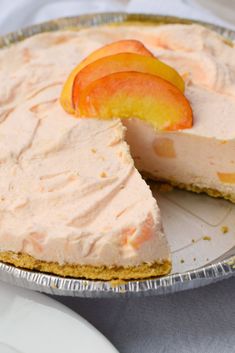 there is a pie with peaches on it