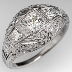 Vintage Engagement Rings | Antique Diamond Rings | EraGem Classic Filigree Ring With Intricate Design For Formal Events, Classic Filigree Ring With Intricate Design For Formal Occasions, Elegant Diamond Filigree Ring With Engraving, Elegant Engraved Diamond Filigree Ring, Classic Engraved White Gold Filigree Ring, Classic Engraved Filigree Ring For Formal Occasions, Classic Filigree Ring With Intricate Design, Classic Engraved Filigree Ring With Round Cut, Engraved Diamond Filigree Ring