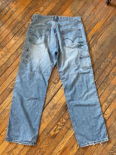 vintage 90s/00s men's levi's denim carpenter jeans. ultilty pocket but no hammer loop 90s Cargo Pocket Denim Jeans, 90s Denim Cargo Pants With Cargo Pockets, 90s Denim Jeans With Cargo Pockets, 90s Style Denim Jeans With Cargo Pockets, 90s Style Medium Wash Straight Leg Cargo Jeans, 90s Straight Leg Medium Wash Cargo Jeans, 90s Denim Cargo Pants With Pockets, 90s Cargo Style Straight Leg Jeans, 90s Straight Leg Cargo Jeans