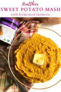 sweet potato mash with fermented tumerice on a glass plate