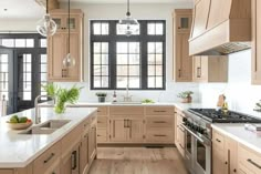 a kitchen filled with lots of wooden cabinets and white counter tops next to a stove top oven