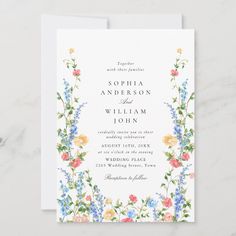 a wedding card with flowers on it