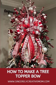 a christmas tree decorated with red and white ribbons, bows and ornaments for the topper