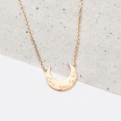 Featuring a single crescent moon and delicate chain, our celestial inspired Moon Necklace is the perfect personalised engraved necklace for a spiritual friend.18K Champagne Gold Plated or 925 Sterling SilverChain length: 16.5”, adjustable to 17.7”Moon charm: 0.8” x 0.8”Hand-engraved in our Paris workshopSent with love in a complimentary gift boxAny slight variations in lettering depth, spacing and alignment from the examples shown are part of the aesthetic and originality of the piece Birth Moon Necklace, Luxury Engraved Crescent Necklace, Personalized Crescent Celestial Necklace, Minimalist Crescent Engraved Jewelry, Minimalist Engraved Crescent Jewelry, Minimalist Crescent Shaped Engraved Jewelry, Necklace Stand, Metal Engraving, Silver Engraving