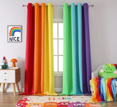 a rainbow colored curtain in a child's room