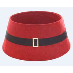 a red and black hat with a gold buckle on the top, sitting in front of a white background