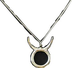 a necklace with an animal's head on it