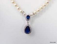 "This something blue necklace has a cubic zirconia teardrop and Austrian premium pearls. Teardrop pendant measures about 1 1/4\" long.  Pearls measure 6 mm in diameter and are accented with rhinestone rondelles.  Finished off with a silver lobster claw clasp closure and 2\" extender chain for additional length.  Please choose desired pearl color, finish and length at checkout.  The length of the necklace is from end to end. The teardrop length is not included in total length.  Keep this in mind when ordering the size that best fits your needs.  If you have any questions message me I'm happy to help! Just glamorous for any bride to be! **Please choose at checkout length, pearl color and size either 6 or 5 mm. Shown in the pictures is the 6 mm Austrian pearls** This necklace is perfect for a Elegant Blue Pearl Necklace For Formal Occasions, Teardrop Pearl Necklace For Wedding, Blue Pearl Drop Necklaces For Wedding, Blue Pearl Drop Necklace For Wedding, Elegant Blue Rhinestone Necklace For Wedding, Elegant Blue Round Pearl Necklace, Elegant Blue Pendant Pearl Necklace, Luxury Blue Pearl Drop Necklace, Luxury Blue Pearl Necklace, Elegant Style