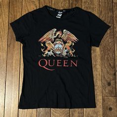 Queen Crest T Shirt Ladies’/Junior’s Size Medium 16” Wide Pit To Pit & 23” Long From Back Collar To Bottom Soft, Made Of 100% Cotton Feminine, Slim Fit Nwot, Never Worn Or Washed Instant Fave! Camisa Rock, Queen Tshirt, Queen Shirts, John Deacon, Bohemian Rhapsody, One By One, Direct To Garment Printer, Online Clothing Stores, The Queen