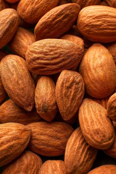 almonds are piled on top of each other