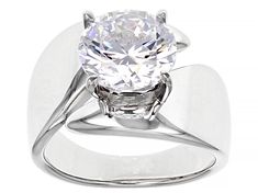 Pre-Owned Koadon™ 7.70ctw  Bella Luce® white diamond simulant  round, rhodium over sterling silver ring. Measures approximately 0.81"L x 0.56"W and is not sizeable. The diamond equivalent weight is 4.66ctw..  This product may be a customer return, vendor sample, or on-air display and is not in its originally manufactured condition.  It may not be new.  In some instances, these items are repackaged by JTV. Modern Cubic Zirconia Jewelry With Round Cut, Modern Round Cut Jewelry For Anniversary, Modern Cubic Zirconia Round Ring, Modern Diamond White Round Cut Jewelry, Modern Formal Jewelry With Round Cut, Modern Brilliant Cut Jewelry For Formal Occasions, Modern Round Cut Jewelry For Formal Occasions, Modern Round-cut Formal Jewelry, Formal Cubic Zirconia Diamond Ring With Polished Finish