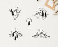 some mountains and trees are drawn in black ink on a white paper with pencils