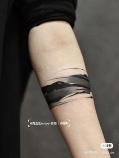 a person with a tattoo on their arm