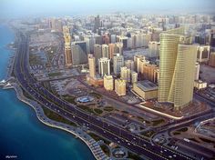 an aerial view of a large city with lots of tall buildings