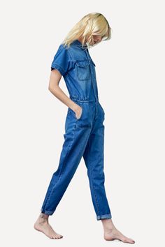 Denim delight for her - this jumpsuit features short sleeves, a button top, and straight legs for easy wear and effortless style. Details Style: Casual Sleeves: Short Neckline: Collar Waistline: Elastic sides Leg Cut: Straight Fabric: 100% Cotton A US design by Insane Gene Size Guide (SIZE S) WAIST - 28 1/2"HIP - 39"FRONT RISE - 13"LEG OPENING - 12 1/2"INSEAM - 28 1/2"CHEST - 40 1/2" The model is wearing a size S MODELHEIGHT 5'10"WAIST 25"HIPS 35" Size Measurement (inch): XS: 26.5 (Waist), 37.0 Trendy Relaxed Fit Short Sleeve Overalls, Trendy Short Sleeve Denim Blue Overalls, Trendy Denim Blue Short Sleeve Overalls, Denim Overalls With Relaxed Fit And Short Sleeves, Trendy Cotton Overalls With Short Sleeves, Casual Denim Blue Short Sleeve Overalls, Denim Blue Short Sleeve Relaxed Fit Jumpsuits And Rompers, Summer Medium Wash Short Sleeve Overalls, Spring Denim Blue Short Sleeve Overalls