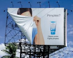 a billboard with an advertisement for pimple's