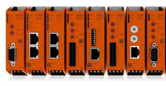 an orange network switch box with eight different switches and two wires attached to each other